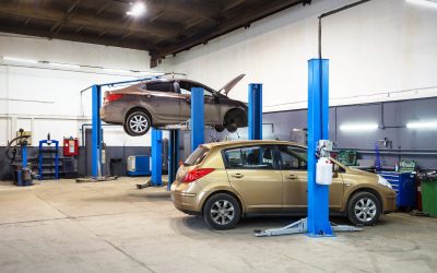 bigstock Car On Lift In Mechanic Shop O 366631471